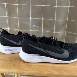 Nike Men’s Black and White Flyknit Running Sneakers